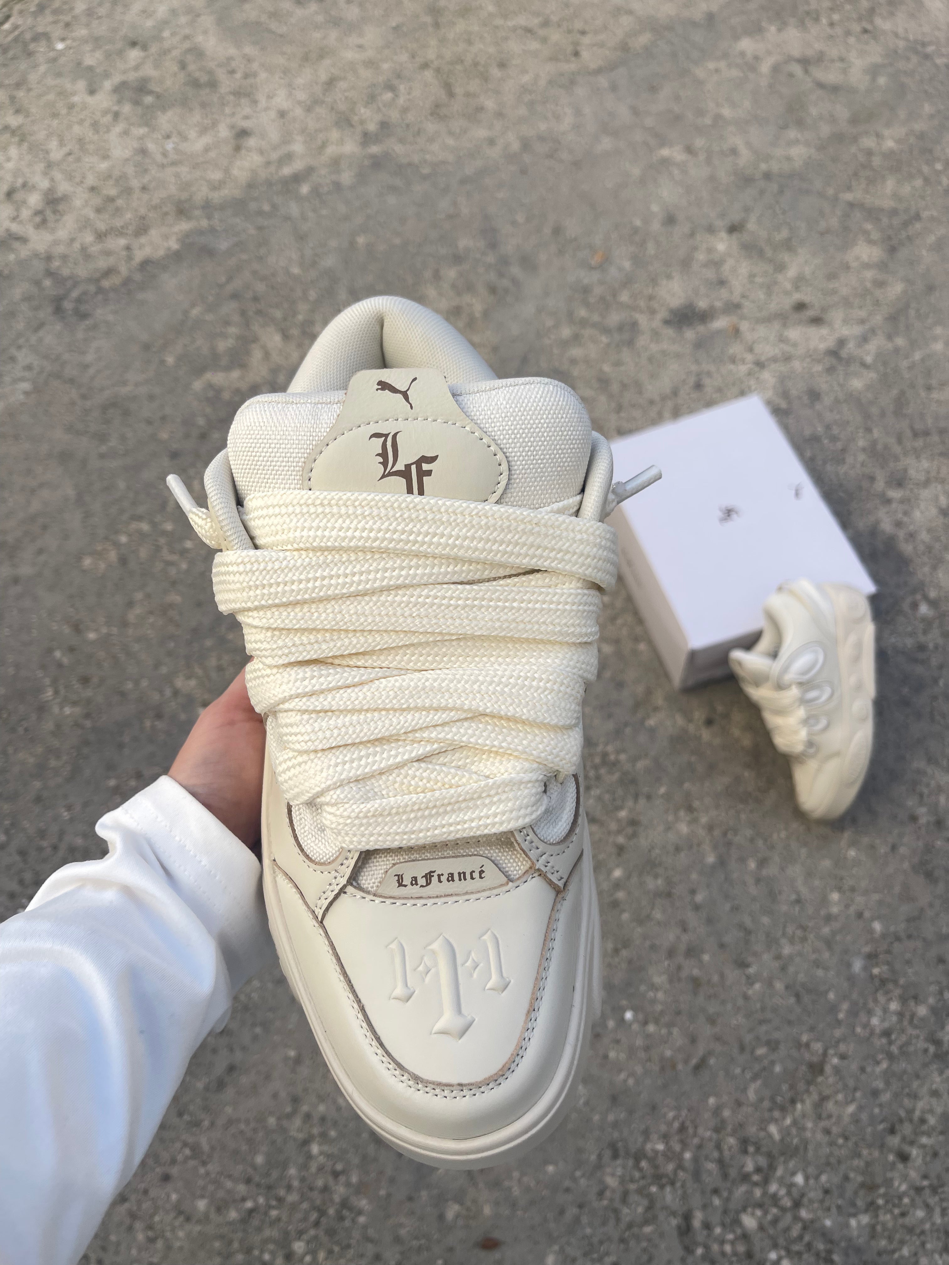 PUMA La France Moment in pelle beige