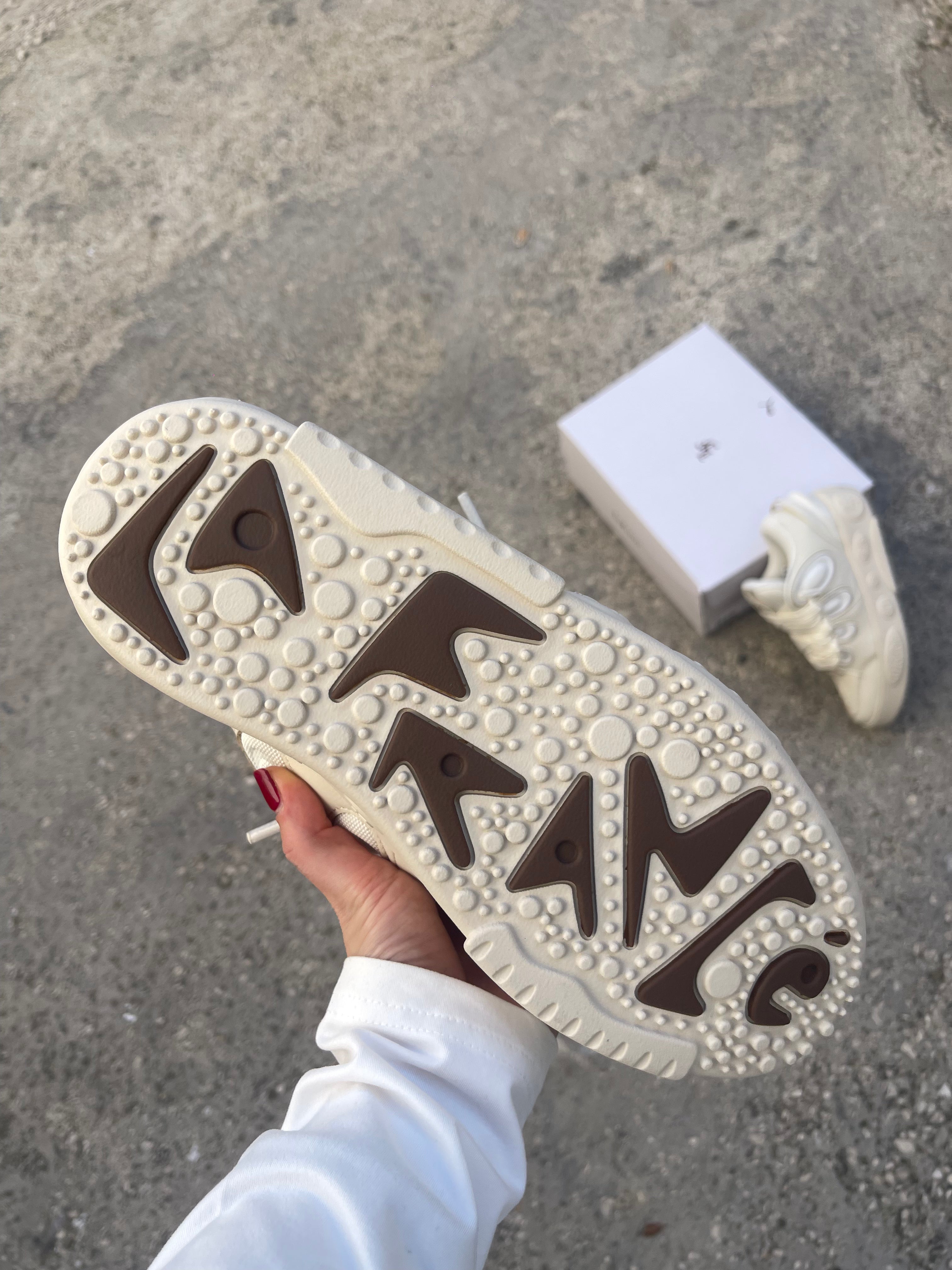 PUMA La France Moment in pelle beige